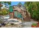 Charming two-story home with a pool, deck, and lush tropical landscaping for outdoor living at 111 29Th W St, Bradenton, FL 34205