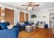 Comfortable living room with stylish furnishings, hardwood floors, and neutral decor, creating a cozy atmosphere at 111 29Th W St, Bradenton, FL 34205
