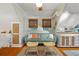 Inviting living room featuring a comfortable couch, hardwood floors, and stylish furnishings at 111 29Th W St, Bradenton, FL 34205