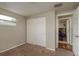 This bedroom has neutral walls, carpet, closet, and natural light at 11320 125Th Ter, Largo, FL 33778