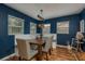 Charming dining room featuring a wooden table and stylish decor at 11320 125Th Ter, Largo, FL 33778