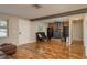 Inviting living room features a fireplace, wood flooring and beamed ceiling at 11320 125Th Ter, Largo, FL 33778