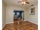 Bright living room with beautiful wood floors and a view of the dining area at 11320 125Th Ter, Largo, FL 33778
