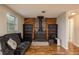 Cozy living room features a fireplace and built-in bookshelves for plenty of storage at 11320 125Th Ter, Largo, FL 33778