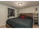 Comfortable main bedroom with neutral colors and large windows at 11320 125Th Ter, Largo, FL 33778