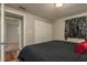 Main bedroom featuring plush carpeting and abundant closet space at 11320 125Th Ter, Largo, FL 33778