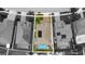 Overhead image shows the roof, solar panels, pool, and yard of a home on Crestridge Loop at 12026 Crestridge Loop, New Port Richey, FL 34655