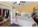 Cozy bedroom featuring hardwood floors, closet, and views at 12026 Crestridge Loop, New Port Richey, FL 34655