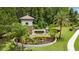 Trinity Preserve entrance with lush landscaping and decorative signage at 12026 Crestridge Loop, New Port Richey, FL 34655