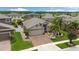 Charming single-story home with a two car garage, brick driveway, and well-manicured lawn at 12026 Crestridge Loop, New Port Richey, FL 34655