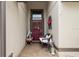 Inviting front porch with brick pavers, decorative accents, and a welcoming ambiance for guests at 12026 Crestridge Loop, New Port Richey, FL 34655