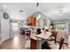 Open concept kitchen with seating area and view to the living room at 12026 Crestridge Loop, New Port Richey, FL 34655