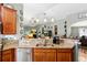 Eat in kitchen view of the sink and living room at 12026 Crestridge Loop, New Port Richey, FL 34655