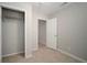 This bedroom features a closet and neutral walls at 1217 W Terrace Dr, Plant City, FL 33563