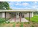 Quaint home featuring a covered porch, perfect for relaxing outdoors at 1217 W Terrace Dr, Plant City, FL 33563
