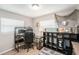 Bright office space featuring a built-in desk, shelving, and beachy decor at 1312 S Evergreen Ave, Clearwater, FL 33756
