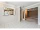 Bright dining area adjacent to kitchen features tile flooring at 13636 Lake Point S Dr, Clearwater, FL 33762