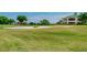 Lush green golf course with sand traps and manicured lawns at 13636 Lake Point S Dr, Clearwater, FL 33762
