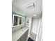 Modern bathroom featuring a stylish vanity, a lighted mirror, and contemporary fixtures at 1380 Gulf Blvd # 805, Clearwater, FL 33767