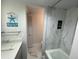 Inviting bathroom featuring new vanity, modern tile work, and a shower at 1380 Gulf Blvd # 805, Clearwater, FL 33767