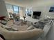 Spacious living room with ocean view, plush seating, and modern decor at 1380 Gulf Blvd # 805, Clearwater, FL 33767