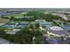 Expansive community amenities including a clubhouse, tennis courts, pool and lush landscaping at 1407 Brattleboro Cir, Sun City Center, FL 33573