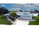 Beautiful single Gathering home featuring mature landscaping, a well maintained yard, and two car garage at 1407 Brattleboro Cir, Sun City Center, FL 33573