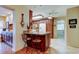 Well-equipped kitchen with an eat-in bar and plenty of cabinet space at 1407 Brattleboro Cir, Sun City Center, FL 33573