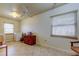 Laundry room with tiled floors, washer and dryer, and storage cabinets at 1407 Brattleboro Cir, Sun City Center, FL 33573