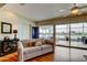 Bright living room with sofa and open access to the lanai, perfect for entertaining at 1407 Brattleboro Cir, Sun City Center, FL 33573