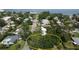 Aerial view of a treed homesite in a residential neighborhood near the water at 152 58Th S Ave, St Petersburg, FL 33705
