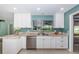Kitchen featuring granite countertops and stainless steel dishwasher at 152 58Th S Ave, St Petersburg, FL 33705