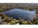 Beautiful aerial view of the lake and surrounding community, showcasing waterfront property at 15612 Howell Park Ln, Tampa, FL 33625