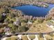 Aerial view of homes and lakefront property at 15612 Howell Park Ln, Tampa, FL 33625