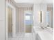 Bathroom with tiled floors, striped walls, and white vanity at 15612 Howell Park Ln, Tampa, FL 33625