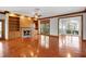 Spacious living room with hardwood floors, fireplace and elegant wood trim at 15612 Howell Park Ln, Tampa, FL 33625