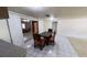 Bright dining room area with a dark wooden table at , Lutz, FL 33559