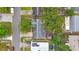 Aerial view of a residential property featuring mature trees and a private backyard at 1737 Prince Philip St, Clearwater, FL 33755