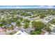 Picturesque aerial view of a residential area, highlighting mature trees and varied home styles at 1737 Prince Philip St, Clearwater, FL 33755