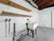 Basement includes a utility sink and two floating shelves at 1737 Prince Philip St, Clearwater, FL 33755