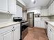 Well-lit kitchen featuring stainless steel appliances and ample counter space at 1737 Prince Philip St, Clearwater, FL 33755