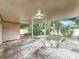 Open patio with concrete flooring offers an open space for entertainment and relaxation at 1737 Prince Philip St, Clearwater, FL 33755