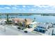 Waterfront townhome community with balconies and garages, situated on a scenic waterway with nearby ocean access at 17817 Gulf Blvd # A, St Petersburg, FL 33708