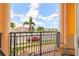 Balcony view of the surrounding town and palm trees from the condo at 17817 Gulf Blvd # A, St Petersburg, FL 33708