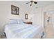 Bedroom featuring a bed, a closet, and a decorative art piece at 17817 Gulf Blvd # A, St Petersburg, FL 33708