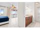 Bedroom featuring access to a bathroom and large sliding doors to a balcony at 17817 Gulf Blvd # A, St Petersburg, FL 33708