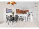 Dining area featuring a round table and chairs, blending into kitchen area at 17817 Gulf Blvd # A, St Petersburg, FL 33708