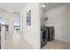 Hallway area featuring a laundry closet with a washer and dryer unit at 17817 Gulf Blvd # A, St Petersburg, FL 33708