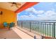Covered patio with seating overlooks the waterfront for relaxing and entertaining with stunning views at 17817 Gulf Blvd # A, St Petersburg, FL 33708