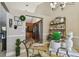 Inviting dining area with stylish decor, open layout, and a view of the adjacent kitchen at 1801 E Lake Rd # 20 G, Palm Harbor, FL 34685